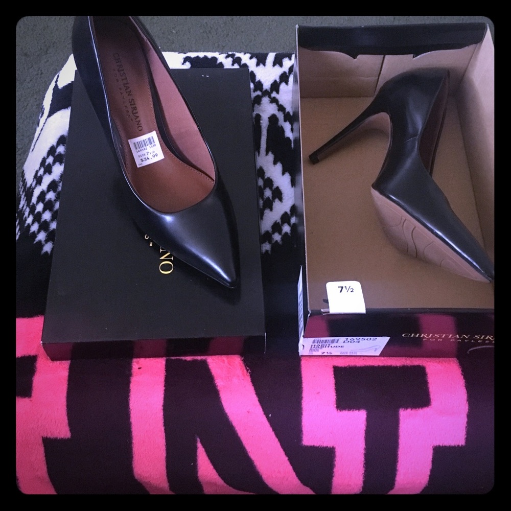 Black heels. Brand new in box